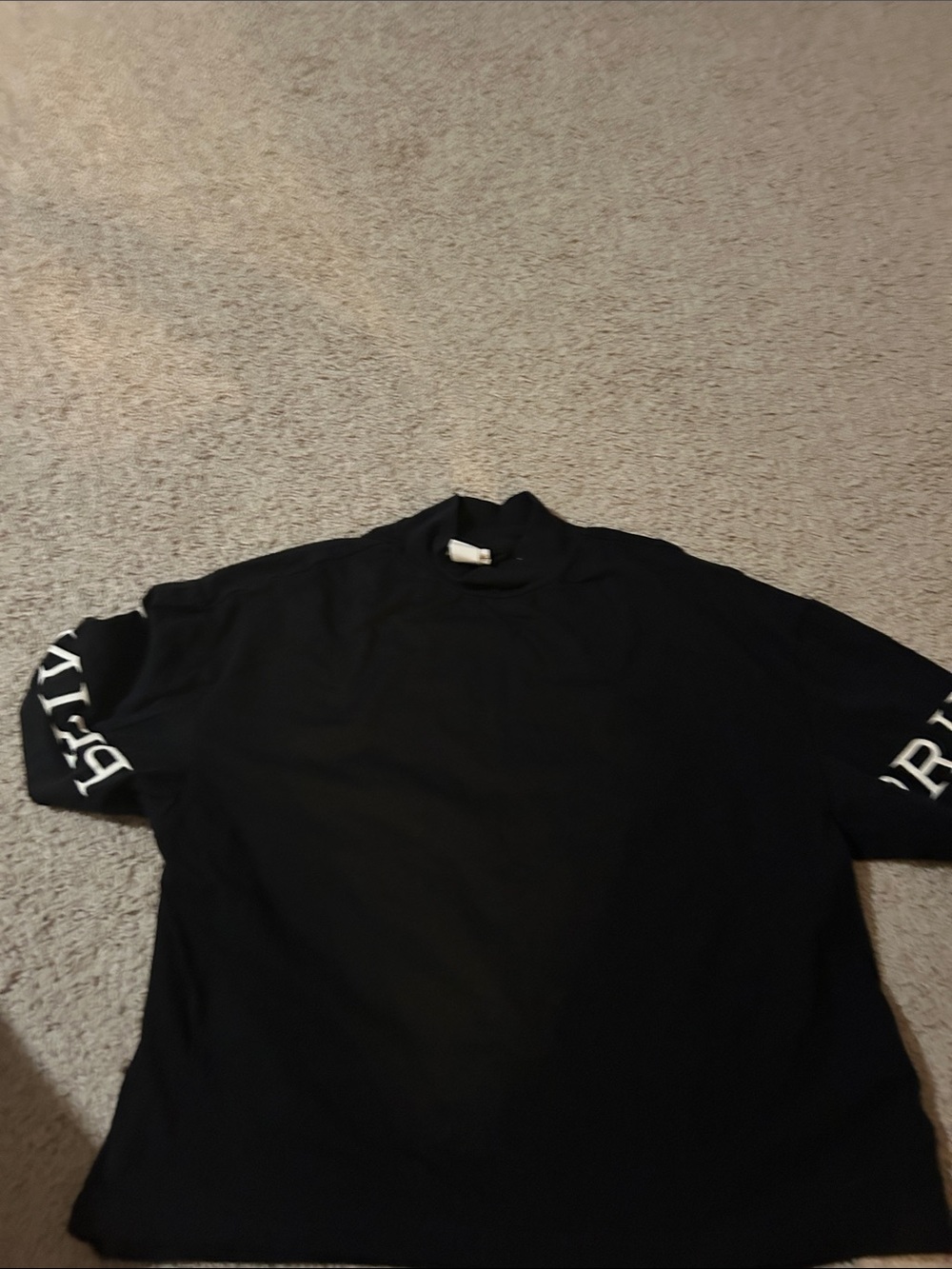 Black Short-Sleeve Shirt with Sleeve Lettering